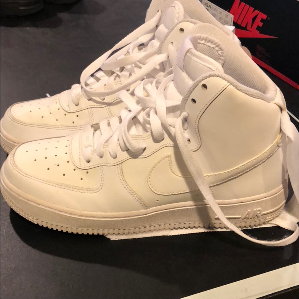 All white high top Air Force One Nike